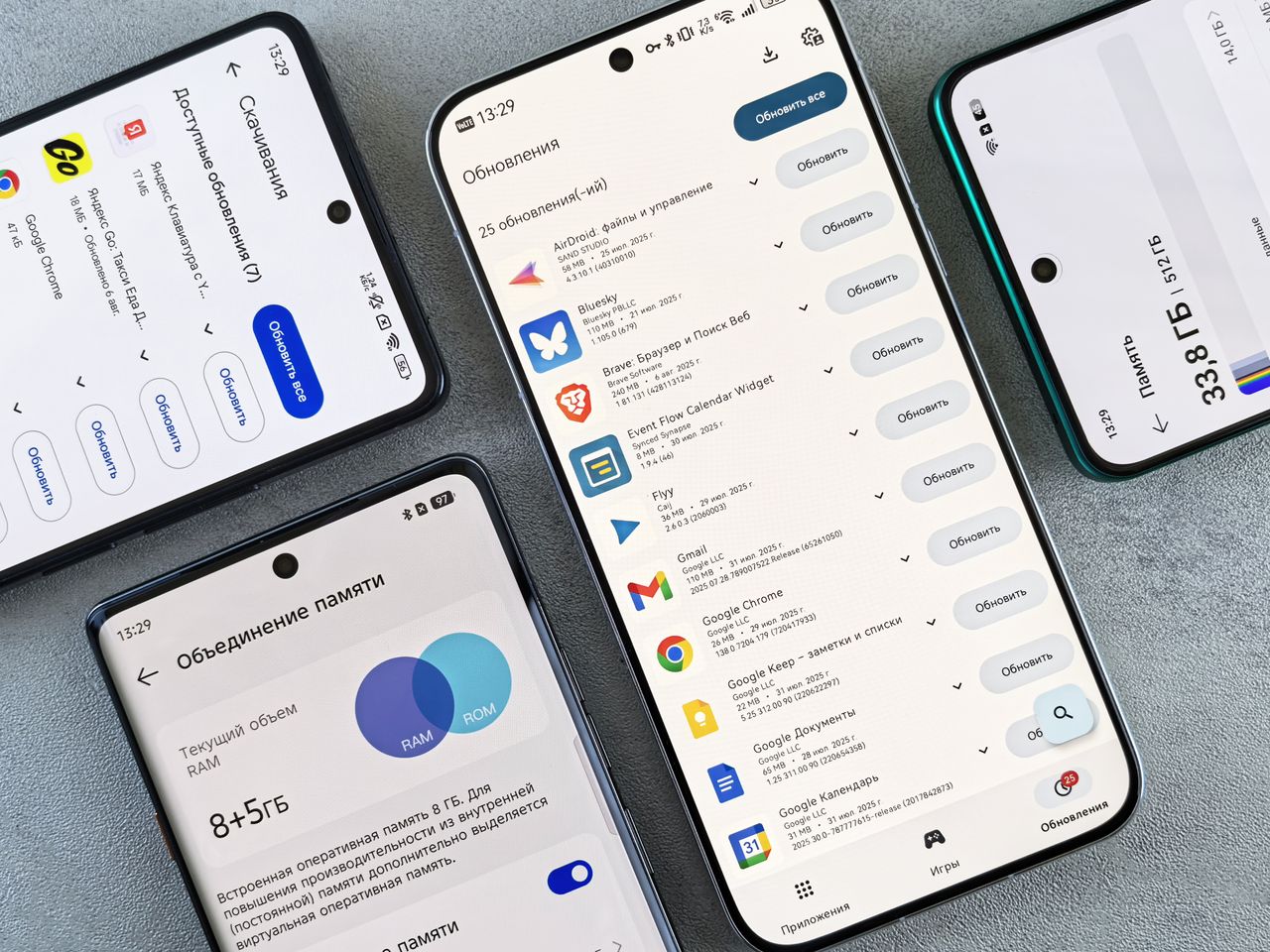 Top view of various smartphones showcasing app update screens indoors.